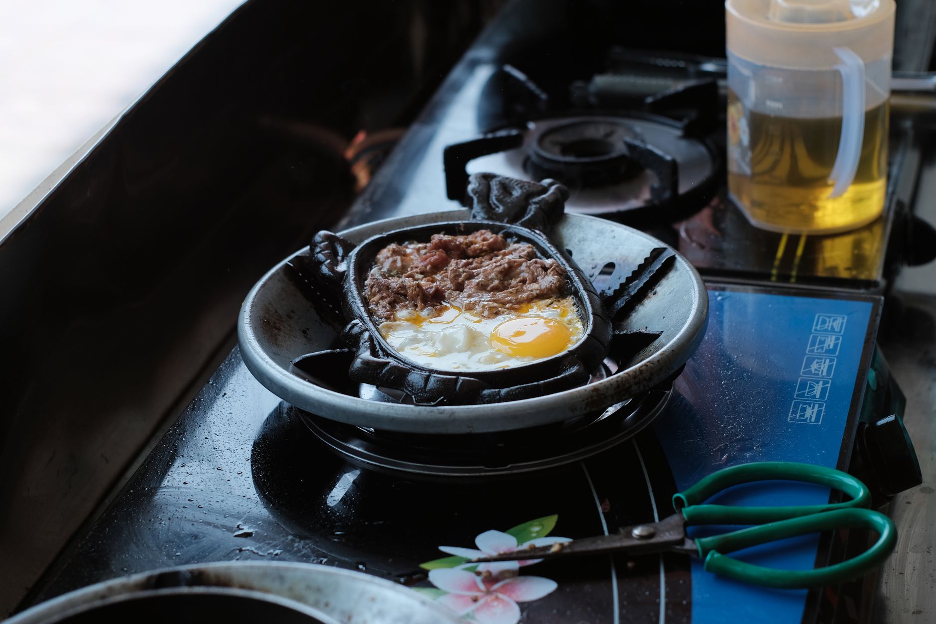 Lodge cast iron skillet sitting on a gas stovetop