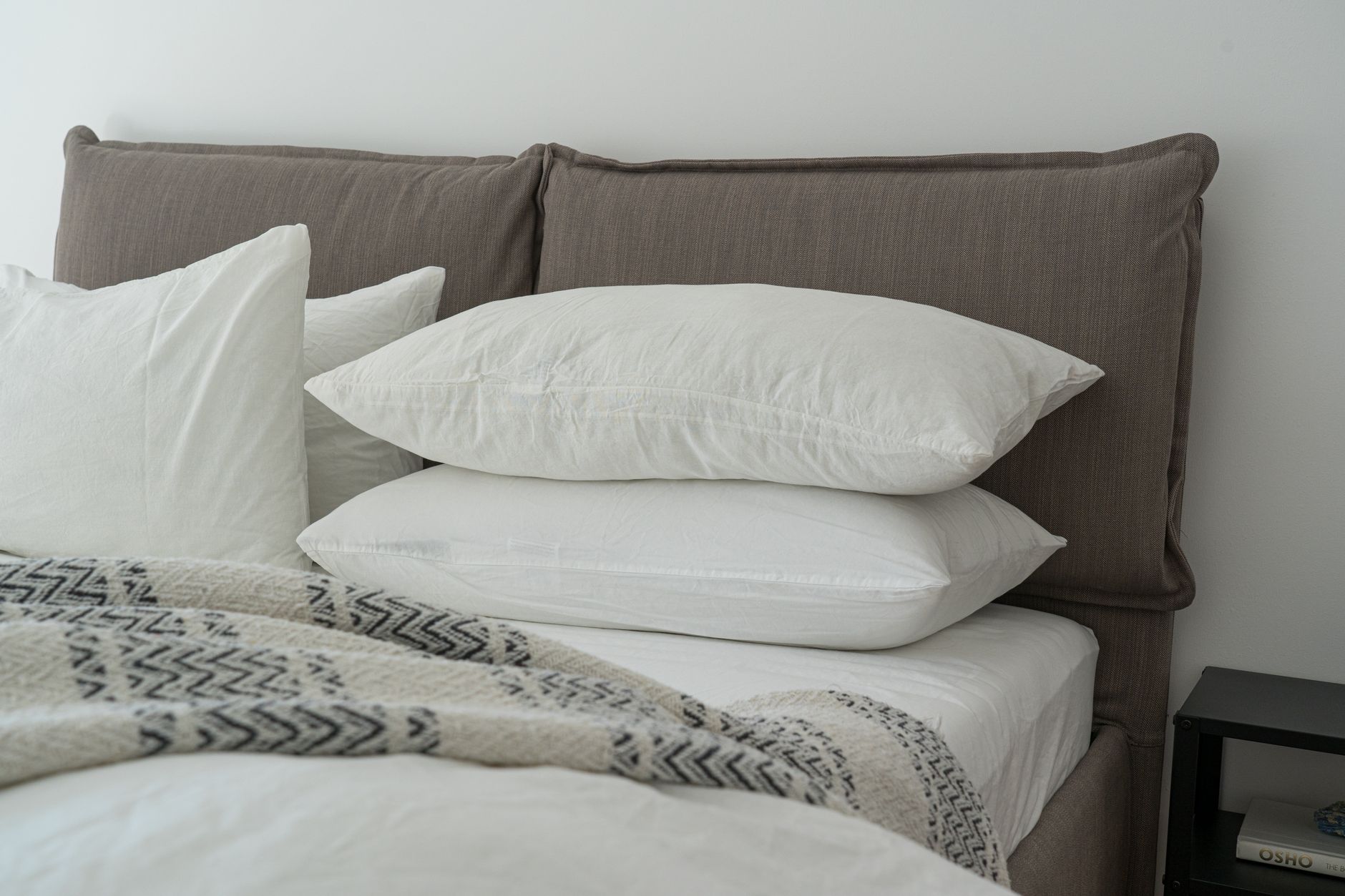 a natural latex hybrid mattress with a wool blanket on a bed