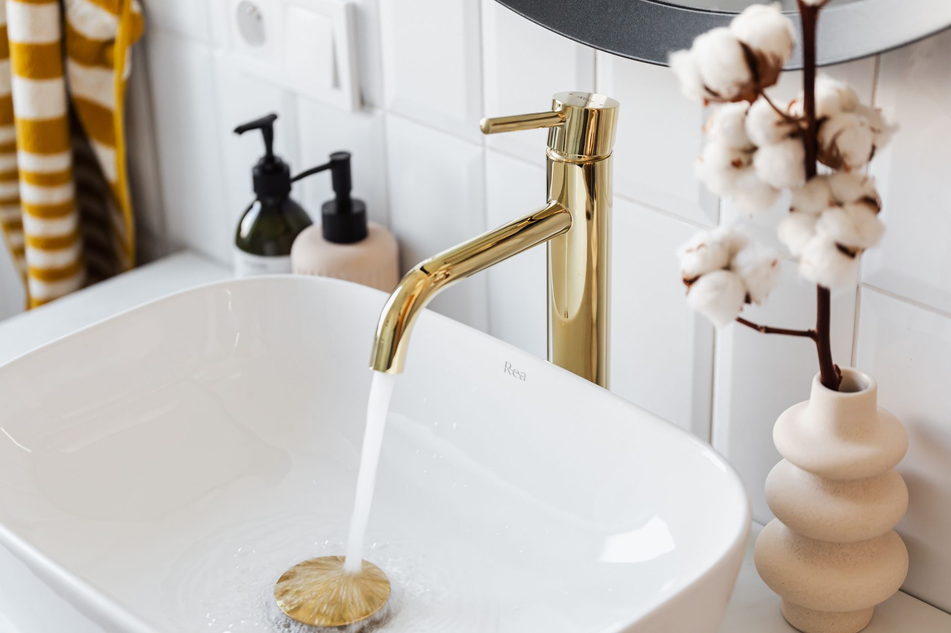 white mineral cleaning powder placed on a white ceramic sink